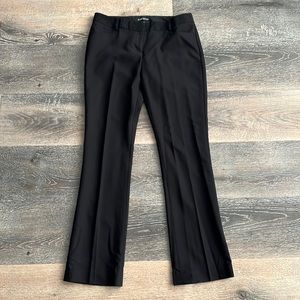 Women’s Express Columnist black low rise boot leg slacks in 4S